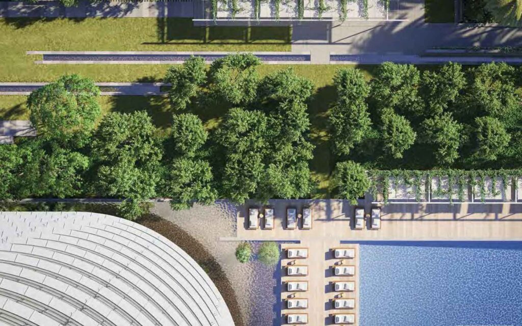 Aerial view of trees and pool from high rise at 87 park Miami