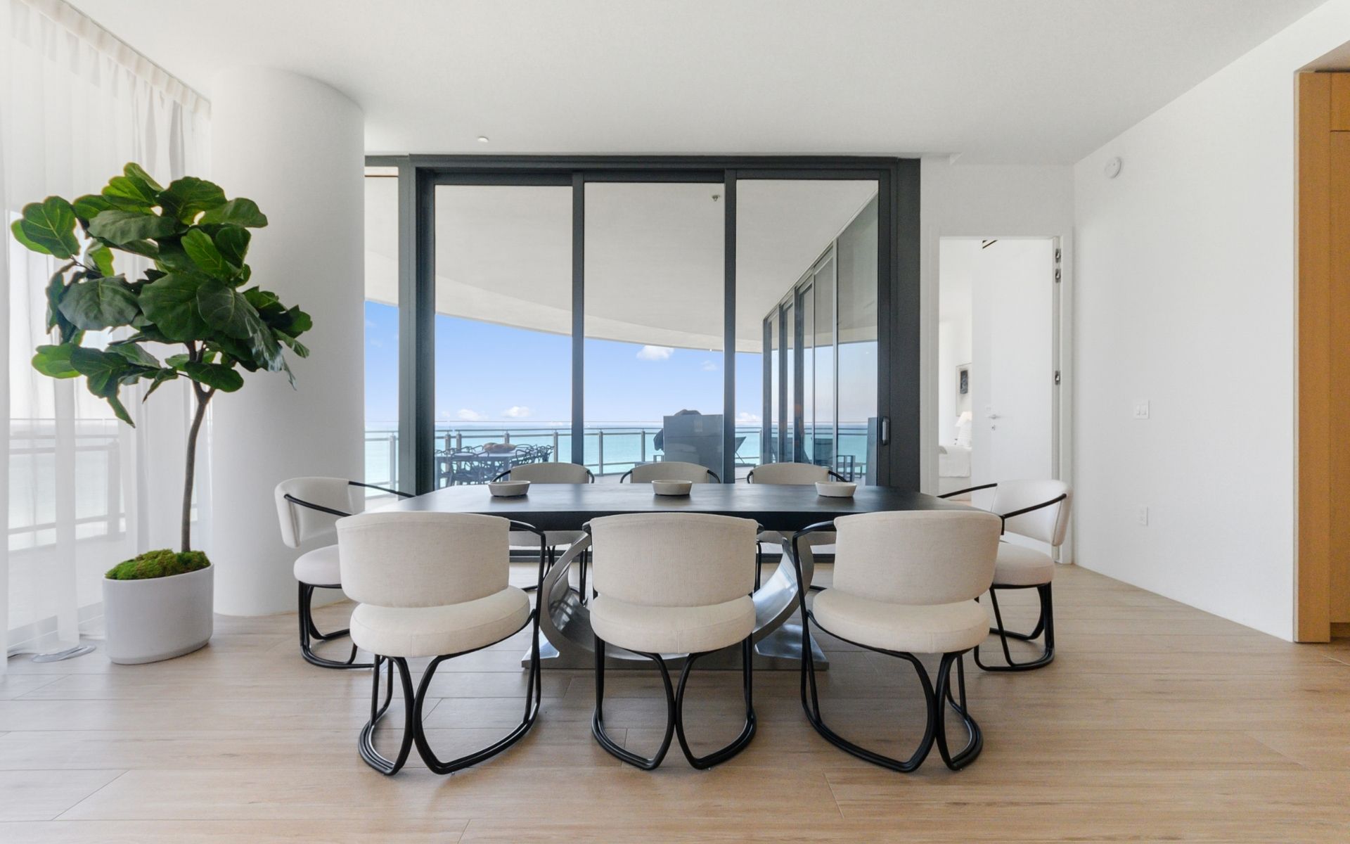 modern dining room table inside 87 park residences